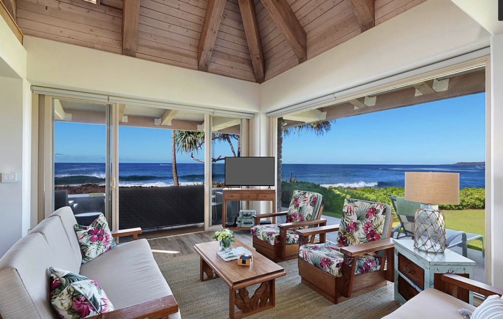 Ocean front living area at Poipu Stone House vacation rental