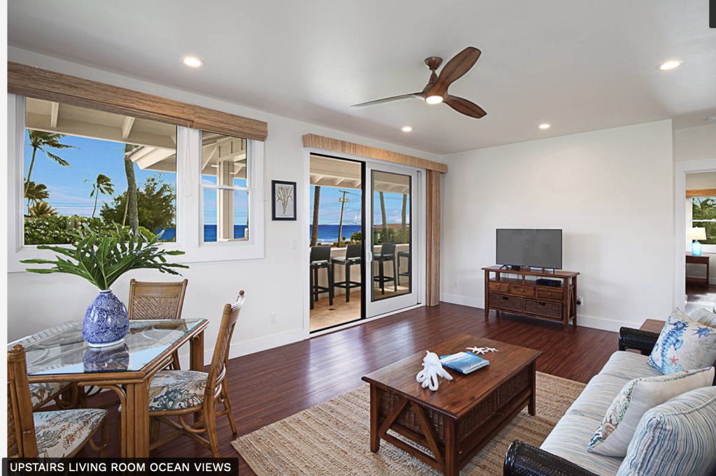 Upstairs living room with ocean views at Lei Hali'a