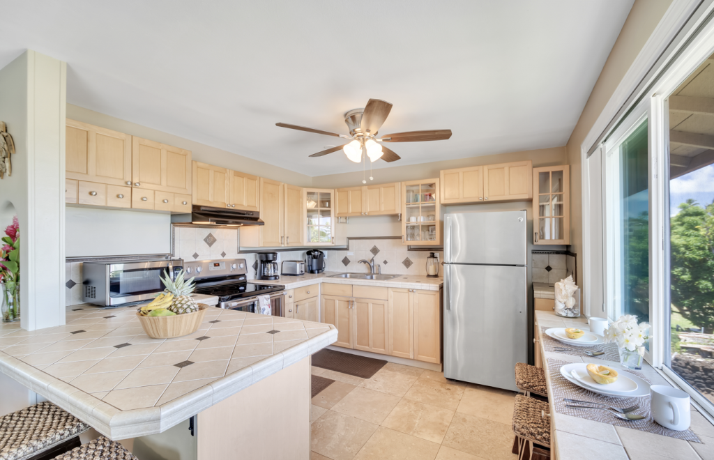 Kitchen and dining areas at Hale Kahana'lu